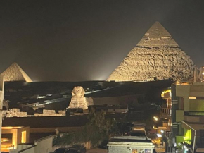 New Sphinx palace pyramids View